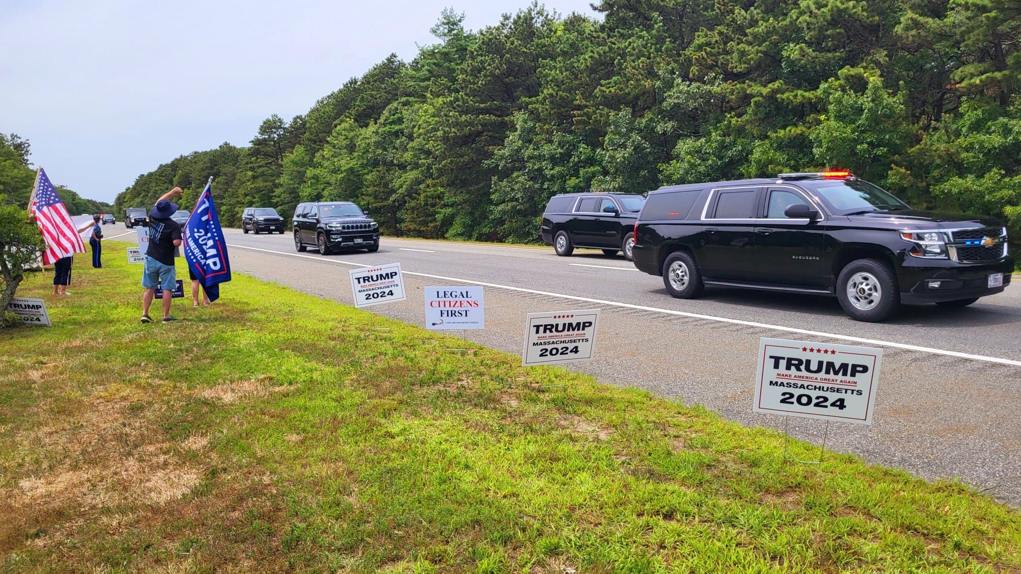 YRTC members along Cape Cod highway with Trump signs as motorcade passes